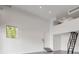 Bright, spacious garage with high ceilings, natural light, and modern fixtures at 1194 N Peninsula, New Smyrna Beach, FL 32169