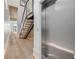 Hallway featuring stairs and an elevator at 1194 N Peninsula, New Smyrna Beach, FL 32169