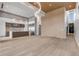 Open concept kitchen with a large island, stainless steel appliances, and wood flooring at 1194 N Peninsula, New Smyrna Beach, FL 32169