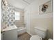 This bathroom has a bath tub, a shower, and a mirror at 1208 Pat Ave, New Smyrna Beach, FL 32168