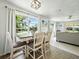 Charming dining area with views of the backyard at 1208 Pat Ave, New Smyrna Beach, FL 32168