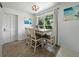 Cozy dining space featuring a classic table and chairs, perfect for Gathering meals at 1208 Pat Ave, New Smyrna Beach, FL 32168