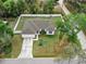 Charming home with manicured lawn and inviting curb appeal, nestled in a quiet neighborhood at 1290 9Th St, Orange City, FL 32763