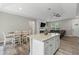 Spacious living area with an island, fireplace, and open to the kitchen at 1290 9Th St, Orange City, FL 32763