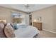 Bright bedroom with sliding glass doors, a ceiling fan, and a spacious layout at 135 Cedar Dunes Dr, New Smyrna Beach, FL 32169