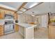 Open-concept kitchen and dining area, perfect for entertaining and Gathering gatherings at 135 Cedar Dunes Dr, New Smyrna Beach, FL 32169