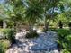 Lush backyard setting with an open-air structure, perfect for relaxing and enjoying nature, ideal for outdoor activities and gatherings at 1370 Jane Lacey Ln, New Smyrna Beach, FL 32168