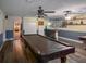 Finished basement with a pool table, air hockey, and wet bar provides ample recreational opportunities at 1370 Jane Lacey Ln, New Smyrna Beach, FL 32168