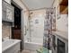 Bathroom featuring a shower-tub combo with floral curtain and a modern vanity at 1370 Jane Lacey Ln, New Smyrna Beach, FL 32168