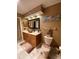 Bathroom featuring a vanity with storage, decorative accents, and tile flooring at 1370 Jane Lacey Ln, New Smyrna Beach, FL 32168