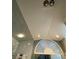 Bathroom ceiling featuring can lighting, bead board and a arched window with blinds at 1370 Jane Lacey Ln, New Smyrna Beach, FL 32168