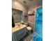 Unique bathroom with whimsical under the sea themed wallpaper at 1370 Jane Lacey Ln, New Smyrna Beach, FL 32168