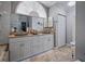 Bathroom with dual vanities, tub, and ample storage at 1370 Jane Lacey Ln, New Smyrna Beach, FL 32168