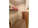 Walk-in closet with shelving and cedar paneling at 1370 Jane Lacey Ln, New Smyrna Beach, FL 32168