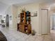 Hallway featuring display cabinet with decor and access to other rooms at 1370 Jane Lacey Ln, New Smyrna Beach, FL 32168