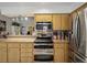 Kitchen area showcasing stainless steel appliances and ample counter space at 1370 Jane Lacey Ln, New Smyrna Beach, FL 32168