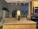 Open kitchen featuring counter seating and views into adjoining living areas, great for entertaining at 1370 Jane Lacey Ln, New Smyrna Beach, FL 32168