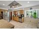 Well-lit kitchen featuring a window with a garden view and stainless appliances at 1370 Jane Lacey Ln, New Smyrna Beach, FL 32168