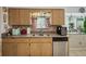 Kitchen sink area with stainless steel appliances and a view of the garden at 1370 Jane Lacey Ln, New Smyrna Beach, FL 32168