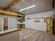 Open living space with vinyl flooring and a wall-mounted television at 1370 Jane Lacey Ln, New Smyrna Beach, FL 32168