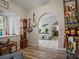 Living room with hardwood floors and an archway leading to dining area at 1370 Jane Lacey Ln, New Smyrna Beach, FL 32168