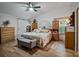 Well-lit main bedroom showcasing stylish furnishings and a comfortable bed at 1370 Jane Lacey Ln, New Smyrna Beach, FL 32168