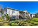 Well-maintained condo exterior featuring a private entrance and manicured lawn on a sunny day at 1600 Big Tree Rd # G3, South Daytona, FL 32119