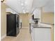 Spacious kitchen with white cabinets, granite countertops and updated appliances at 1600 Big Tree Rd # G3, South Daytona, FL 32119