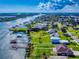 This stunning aerial captures waterfront living with private docks and beautiful homes along the water at 2019 S Riverside, Edgewater, FL 32141