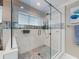 Bathroom featuring a glass enclosed shower with mosaic tile floors at 2019 S Riverside, Edgewater, FL 32141