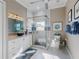 Modern bathroom with a glass-enclosed shower, double sink vanity, and stylish fixtures at 2019 S Riverside, Edgewater, FL 32141