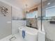 Relaxing bathroom with a freestanding tub, a glass enclosed shower, and modern fixtures at 2019 S Riverside, Edgewater, FL 32141