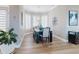Well-lit dining room featuring modern decor, a stylish chandelier, and a bay window at 2019 S Riverside, Edgewater, FL 32141