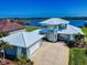 Waterfront home boasts a two-car garage, a beautifully landscaped yard, and access to the water at 2019 S Riverside, Edgewater, FL 32141