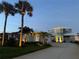 Lovely home with a two-car garage, manicured lawn, and professional exterior lighting at 2019 S Riverside, Edgewater, FL 32141