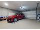 Bright and organized garage with epoxy flooring and space for two cars, plus storage at 2019 S Riverside, Edgewater, FL 32141