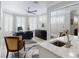 Well-lit home office featuring custom built-ins and ample windows at 2019 S Riverside, Edgewater, FL 32141