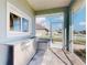 Screened outdoor kitchen with stainless steel appliances and a sink is perfect for entertaining at 2019 S Riverside, Edgewater, FL 32141
