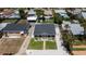 Charming home with a manicured front lawn, landscaping, and inviting entryway at 216 Kirkland Dr, New Smyrna Beach, FL 32169