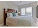 Relaxing bedroom with a comfortable bed and neutral decor at 216 Kirkland Dr, New Smyrna Beach, FL 32169