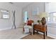 Bright entryway featuring neutral walls, tile flooring, and stylish decor at 216 Kirkland Dr, New Smyrna Beach, FL 32169