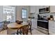 This stylish kitchen features a breakfast nook, stainless steel appliances, and ample counter space at 216 Kirkland Dr, New Smyrna Beach, FL 32169
