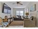 Inviting living room featuring a neutral color palette, comfortable seating, and stylish decor at 216 Kirkland Dr, New Smyrna Beach, FL 32169