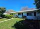 Charming single-story home featuring a well-maintained lawn and trimmed hedges at 2321 Tamarind Dr, Edgewater, FL 32141