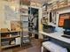 Well-organized office space with closet storage and shelving at 2321 Tamarind Dr, Edgewater, FL 32141