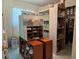Well-organized pantry featuring shelving units filled with various storage containers at 2321 Tamarind Dr, Edgewater, FL 32141