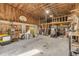Spacious barn interior with high ceilings, basketball hoop, and ample storage space at 2533 Glenhaven St, New Smyrna Beach, FL 32168