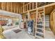 Barn interior showcasing workspace and access to an outdoor area at 2533 Glenhaven St, New Smyrna Beach, FL 32168