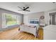 Inviting bedroom with built-in bench, large windows, and ample natural light at 2533 Glenhaven St, New Smyrna Beach, FL 32168