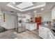 Bright kitchen with white cabinets, stainless steel appliances, and a skylight at 2533 Glenhaven St, New Smyrna Beach, FL 32168
